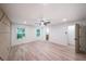 Bedroom with a decorative accent wall, hardwood flooring, and natural light at 2189 Spear Point Dr, Marietta, GA 30062