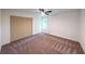 Clean bedroom featuring closet and a window with natural light at 2189 Spear Point Dr, Marietta, GA 30062