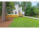 Beautiful home with well-kept lawn and attractive landscaping in a private, wooded location at 2189 Spear Point Dr, Marietta, GA 30062