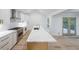 Gourmet kitchen with stainless appliances, island with marble countertop and designer lighting at 2189 Spear Point Dr, Marietta, GA 30062