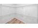 A well-lit walk-in closet offers ample storage with wire shelving and wood floors at 2189 Spear Point Dr, Marietta, GA 30062