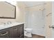 Bathroom with modern vanity, framed mirror, and tub-shower combo with white subway tile at 2941 Governors Ct, Marietta, GA 30066