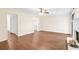 Spacious living room with a cozy fireplace, seamless access to other areas, and warm tones at 2941 Governors Ct, Marietta, GA 30066
