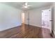 Bedroom featuring hardwood floors and an attached bathroom at 3620 W Lawrenceville St, Duluth, GA 30096