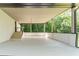 Spacious covered carport with a staircase, offering ample parking and sheltered access to the home at 3620 W Lawrenceville St, Duluth, GA 30096