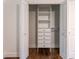 Open closet with built in shelves and drawers at 3620 W Lawrenceville St, Duluth, GA 30096