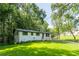 Charming single Gathering home with lovely landscaping and a well-manicured lawn at 3620 W Lawrenceville St, Duluth, GA 30096