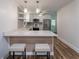 Eat-in kitchen featuring an island, stainless steel appliances, and bar seating at 3620 W Lawrenceville St, Duluth, GA 30096