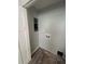 The laundry room features new floors and hookups for a washer and dryer at 4610 Wilson James Sw Rd, Atlanta, GA 30331