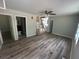 An open concept living room offers beautiful new flooring and lots of space at 4610 Wilson James Sw Rd, Atlanta, GA 30331