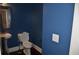 This powder room features a pedestal sink and a toilet at 5896 Cliftondale Dr, Atlanta, GA 30349