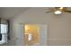Bedroom features a ceiling fan and double doors to another room at 5896 Cliftondale Dr, Atlanta, GA 30349