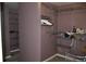 Spacious walk-in closet includes wire shelving and hanging rods at 5896 Cliftondale Dr, Atlanta, GA 30349
