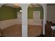 Well-lit dining room with coffered ceilings, carpet flooring, and wainscotting at 5896 Cliftondale Dr, Atlanta, GA 30349