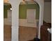 Well-lit dining room with coffered ceilings, carpet flooring, and wainscotting at 5896 Cliftondale Dr, Atlanta, GA 30349