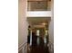 Elegant foyer featuring hardwood floors, decorative molding, and an open view to the living spaces at 5896 Cliftondale Dr, Atlanta, GA 30349