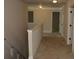 Hallway with neutral paint, carpet, and traditional trim at 5896 Cliftondale Dr, Atlanta, GA 30349