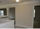 Hallway featuring neutral walls, an open floor plan, and carpet at 5896 Cliftondale Dr, Atlanta, GA 30349