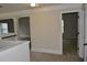 Hallway featuring neutral walls, an open floor plan, and carpet at 5896 Cliftondale Dr, Atlanta, GA 30349