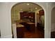 Gourmet kitchen featuring stainless steel appliances, granite countertops, and dark wood cabinetry at 5896 Cliftondale Dr, Atlanta, GA 30349