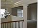 Elegant foyer with a chandelier and detailed molding showcases the home's refined architectural details at 5896 Cliftondale Dr, Atlanta, GA 30349