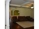 Inviting living room with hardwood floors, a beamed ceiling, and comfortable seating at 5896 Cliftondale Dr, Atlanta, GA 30349