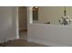 Open-concept layout with a statement chandelier enhances this home's inviting living space at 5896 Cliftondale Dr, Atlanta, GA 30349