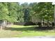 Spacious side yard featuring a well-maintained lawn at 5896 Cliftondale Dr, Atlanta, GA 30349