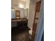 Bathroom with wooden floors, vanity, shower, and toilet at 1297 Tree Creek Ct, Clarkston, GA 30021