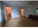 Bedroom with carpeted floors, neutral walls, and large closet for storage at 1297 Tree Creek Ct, Clarkston, GA 30021