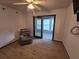 Cozy bedroom with wood-look floors, neutral walls and ceiling fan for added comfort at 1297 Tree Creek Ct, Clarkston, GA 30021
