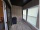 Light-filled sunroom with multiple windows and a door at 1297 Tree Creek Ct, Clarkston, GA 30021