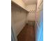 Functional walk-in closet with built in shelving and two-drawer cabinet, ideal for organization at 1297 Tree Creek Ct, Clarkston, GA 30021