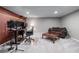 Finished basement area with modern recording studio setup and comfortable seating, perfect for entertainment at 2864 Wyndcliff Ct, Marietta, GA 30066