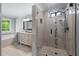 Modern bathroom featuring a tiled shower, soaking tub, and spacious vanity at 2864 Wyndcliff Ct, Marietta, GA 30066