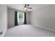 Bright bedroom with a ceiling fan and a view of the neighborhood at 2864 Wyndcliff Ct, Marietta, GA 30066