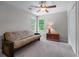 Comfortable bedroom with carpeted floors, a futon, and natural light from the windows at 2864 Wyndcliff Ct, Marietta, GA 30066