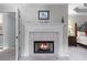 Beautiful fireplace detail in the main bedroom suite with natural light at 2864 Wyndcliff Ct, Marietta, GA 30066