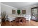 Spacious living room with hardwood floors, corner seating and natural light at 2864 Wyndcliff Ct, Marietta, GA 30066