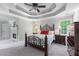 Spacious main bedroom featuring a fireplace, trey ceiling, and sitting area at 2864 Wyndcliff Ct, Marietta, GA 30066