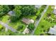 Aerial view of a landscaped property featuring lush greenery and mature trees at 4212 Worth Nw St, Acworth, GA 30101