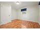 Bedroom with hardwood floors, blue curtain, and closet at 4212 Worth Nw St, Acworth, GA 30101