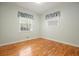Bright bedroom with hardwood floors and natural light, creating a serene atmosphere at 4212 Worth Nw St, Acworth, GA 30101