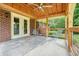 Covered patio offering a ceiling fan, wooden posts and railings, and a view of the backyard at 4212 Worth Nw St, Acworth, GA 30101
