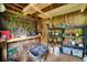 Interior view of the shed provides ample storage space and a workbench for various projects at 4212 Worth Nw St, Acworth, GA 30101