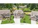 Beautiful home featuring manicured lawn, mature trees and an inviting outdoor space at 4972 Park Vale Dr, Sugar Hill, GA 30518