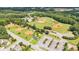 Community aerial shot highlighting the ballpark with multiple baseball fields, parking, and surrounding neighborhoods at 4972 Park Vale Dr, Sugar Hill, GA 30518