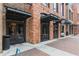 Street view of Central City Tavern and Rooftop restaurant exteriors with brick facade and awning entrances at 4972 Park Vale Dr, Sugar Hill, GA 30518