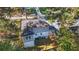Aerial view of home surrounded by trees and a well-manicured yard and new roof at 1270 Graymont Sw Dr, Atlanta, GA 30310