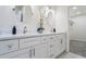 Bathroom vanity features dual sinks and a marble countertop, offering a touch of luxury at 1270 Graymont Sw Dr, Atlanta, GA 30310